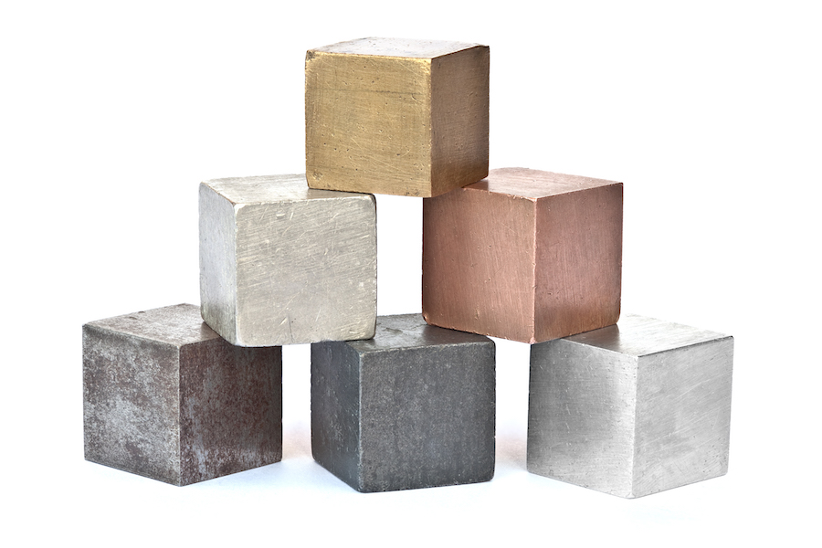 Metal cubes stacked in the shape of a pyramid.